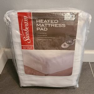 Twin heated mattress pad